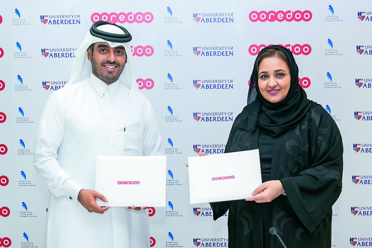 Sheikh Nasser bin Hamad bin Nasser Al Thani, Chief New Business Officer, Ooredoo Qatar, and Dr Sheikha Aisha bint Faleh Al Thani, Chairperson of Al Faleh Group for Educational and Academic Services, after signing the agreement.
