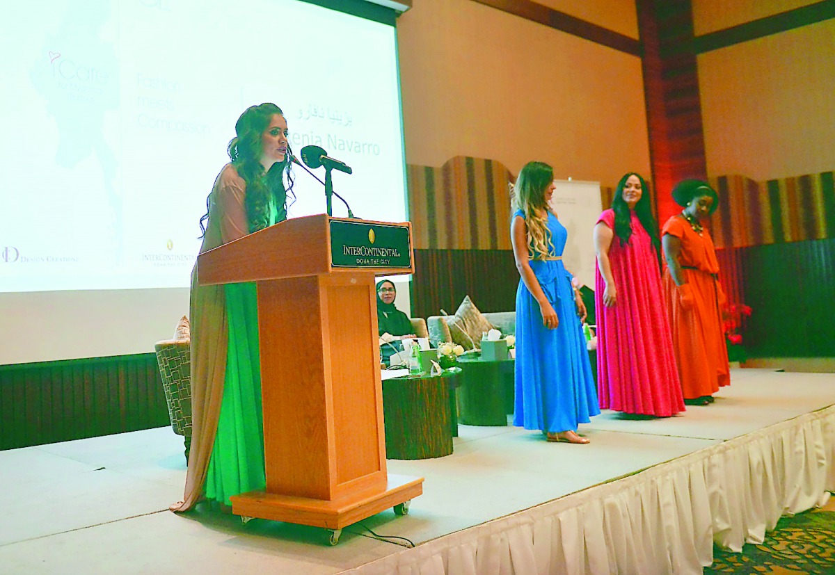 Four models in the summer dresses, which were launched at the event yesterday. Each dress has a symbolic name — Compassion, Care, Peace, and Love. Pic: Baher Amin/ The Peninsula