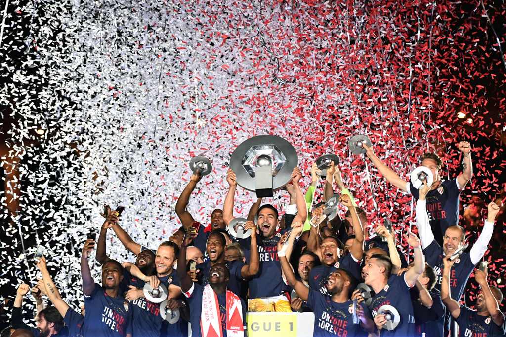 Monaco players celebrate at the end of their last French L1 football match Monaco (ASM) vs St Etienne (ASSE) on May 17, 2017 at the 