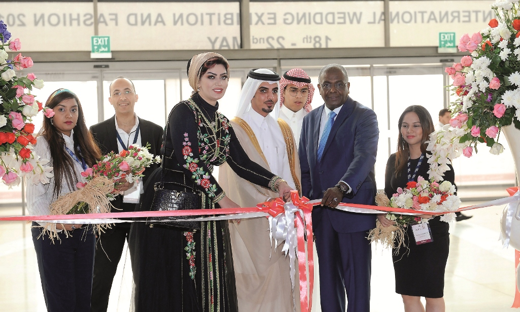 Ahmed bin Hamad, owner of Royal Events, with Eme, makeup artist and Hadi Al Zain Ali, CEO of Qatar Expo, jointly inaugurating the IWED 2017 at the Doha Exhibition and Convention Center in Doha, yesterday. Pic: Salim Matramkot / The Peninsula
