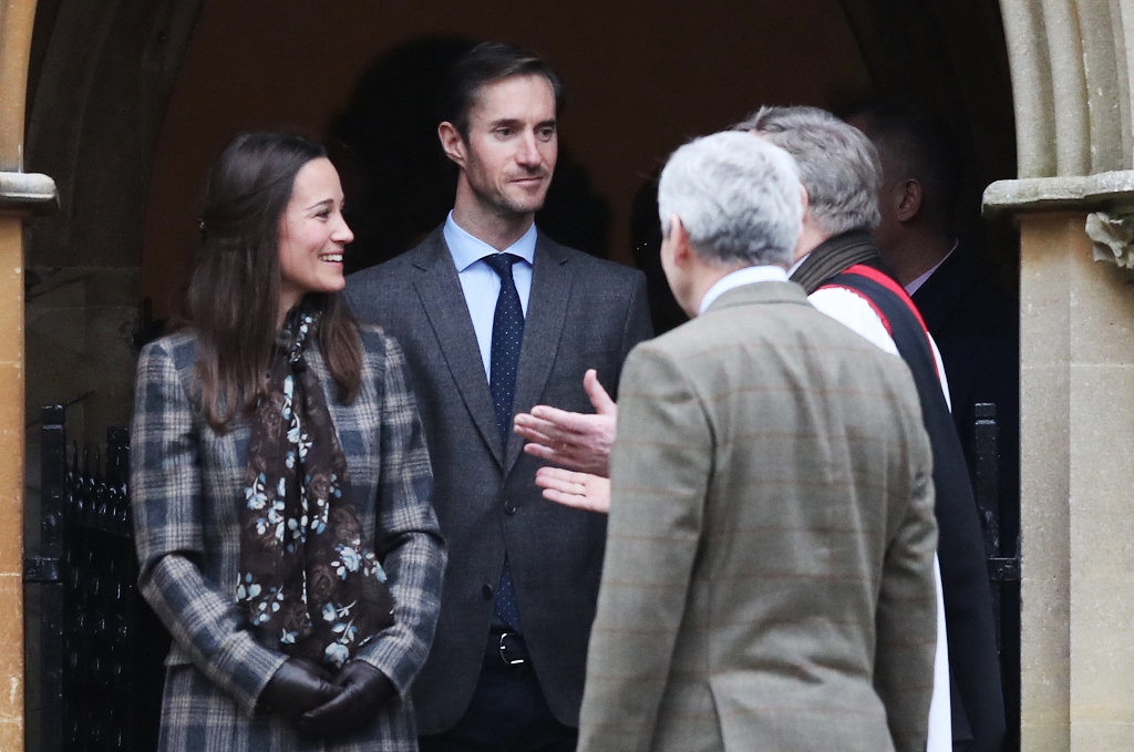 (FILES) This file photo taken on December 25, 2016 shows Pippa Middleton (L) and James Matthews departing after attending a Christmas Day service at St Mark's Church in Englefield. AFP / POOL / Andrew Matthews
