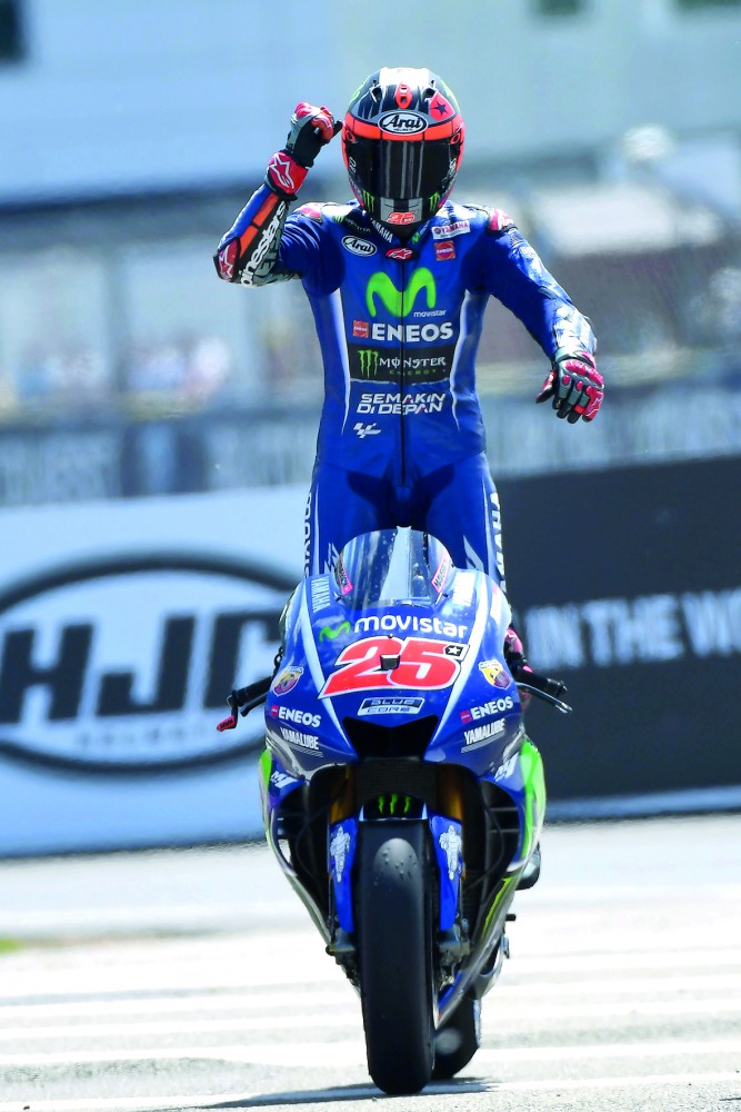 Maverick Vinales of Spain celebrates after winning the French MotoGP in Le Mans, northwestern France, yesterday.