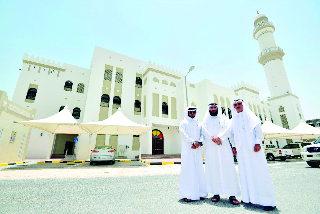 Ashghal’s engineers in front of the completed mosques in Muaither. 