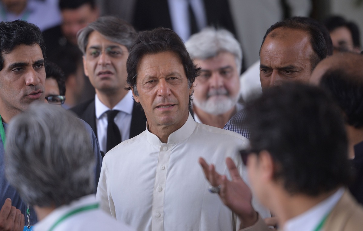 Pakistani opposition leader and head of the Pakistan Tehreek-i-Insaf (PTI) party Imran Khan leaves the Supreme Court after attending a hearing on the Panama Papers case in Islamabad on May 22, 2017. (AFP / AAMIR QURESHI)