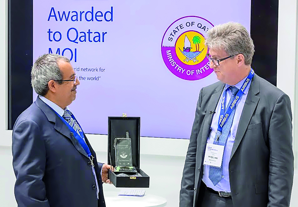 An official receiving the award in Hong Kong. 