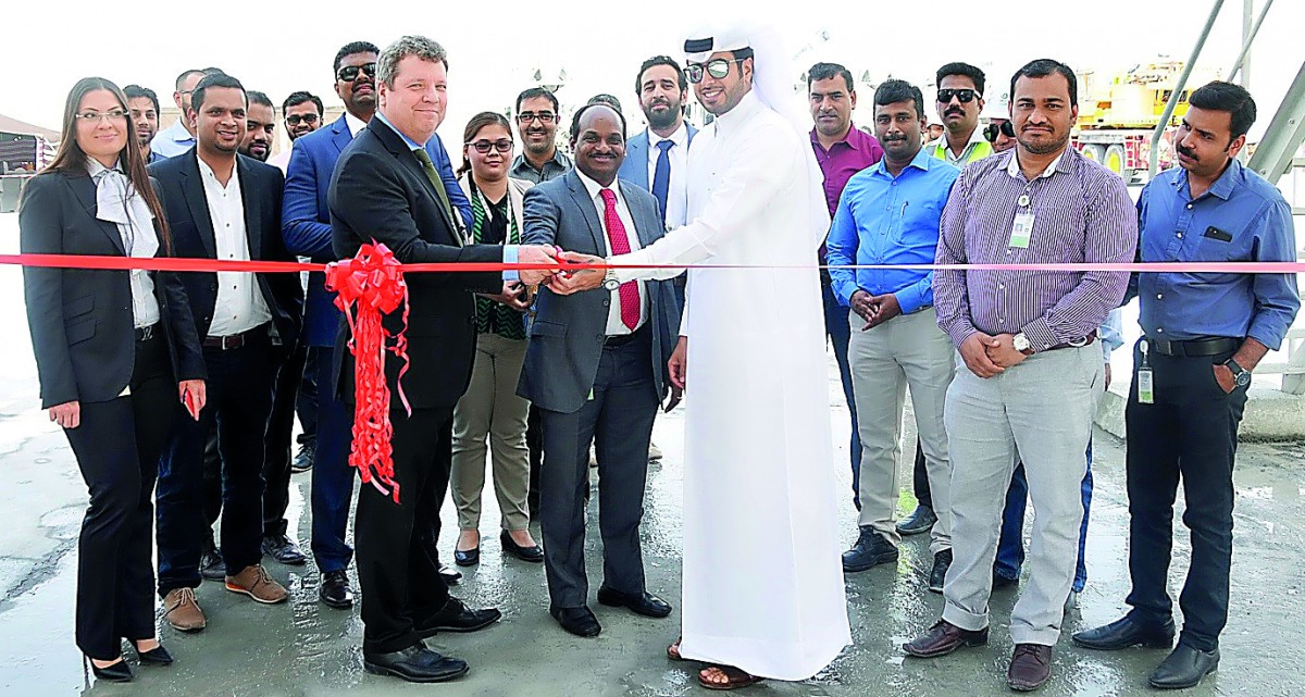 Abdullah Mohammed Al Kuwari, Acting CEO; Sure V. Satyanarayana and  Manateq Senior Project Manager Damien Healey jointly inaugurating the new ready mix plant in the Manateq Economic Zone. 