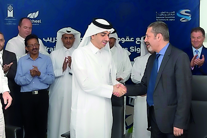 Officials at the signing ceremony for awarding the contracts.