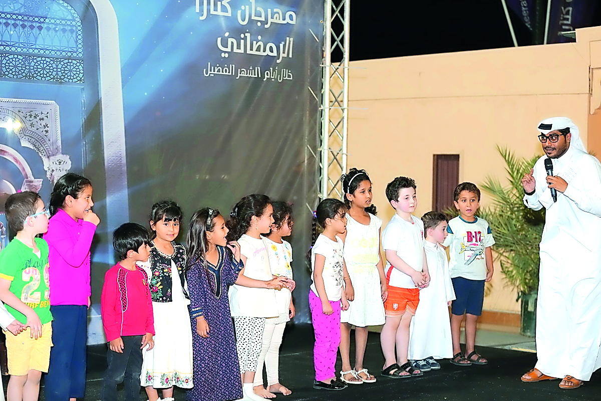 Children taking part in one of the competitions at Katara Ramadan Festival.
