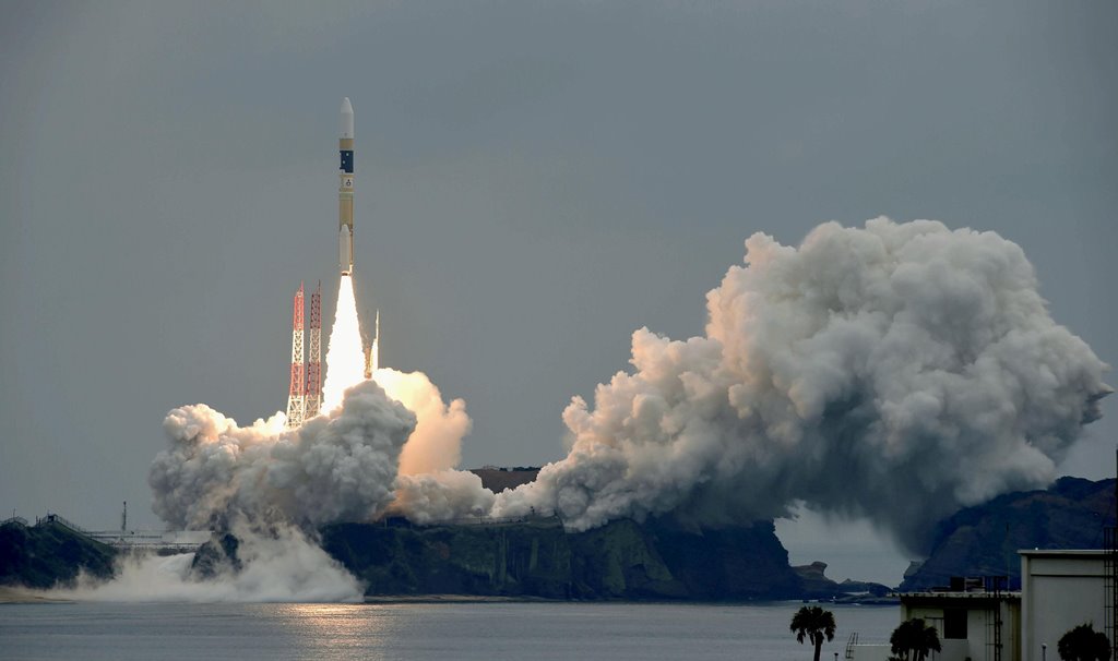 A H-IIA rocket, carrying a Michibiki 2 satellite, one of four satellites that will augment regional navigational systems, lifts off from the launching pad at Tanegashima Space Center on the southwestern island of Tanegashima, Japan, in this photo taken by