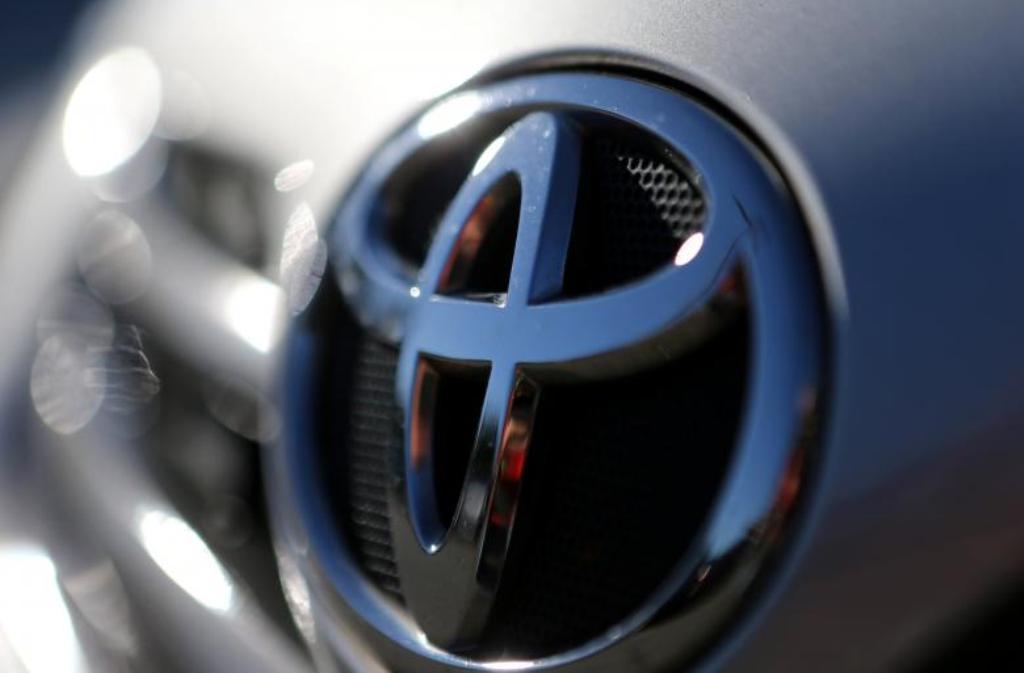 The Toyota logo is seen on a car in a park lot in Sao Paulo, Brazil June 2, 2017. REUTERS/Paulo Whitaker.