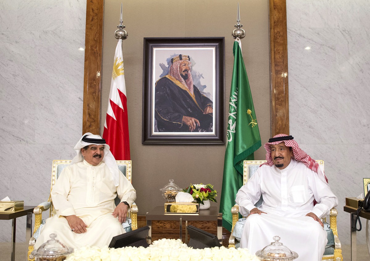 A handout photo made available by the Saudi press Agency shows the Custodian of the Two Holy Mosques King Salman bin Abdulaziz al-Saud of Saudi Arabia (R) meeting with HH the King of Bahrain Hamad bin Issa al-Khalifa in Jeddah on June 7, 2017.  AFP/ Banda
