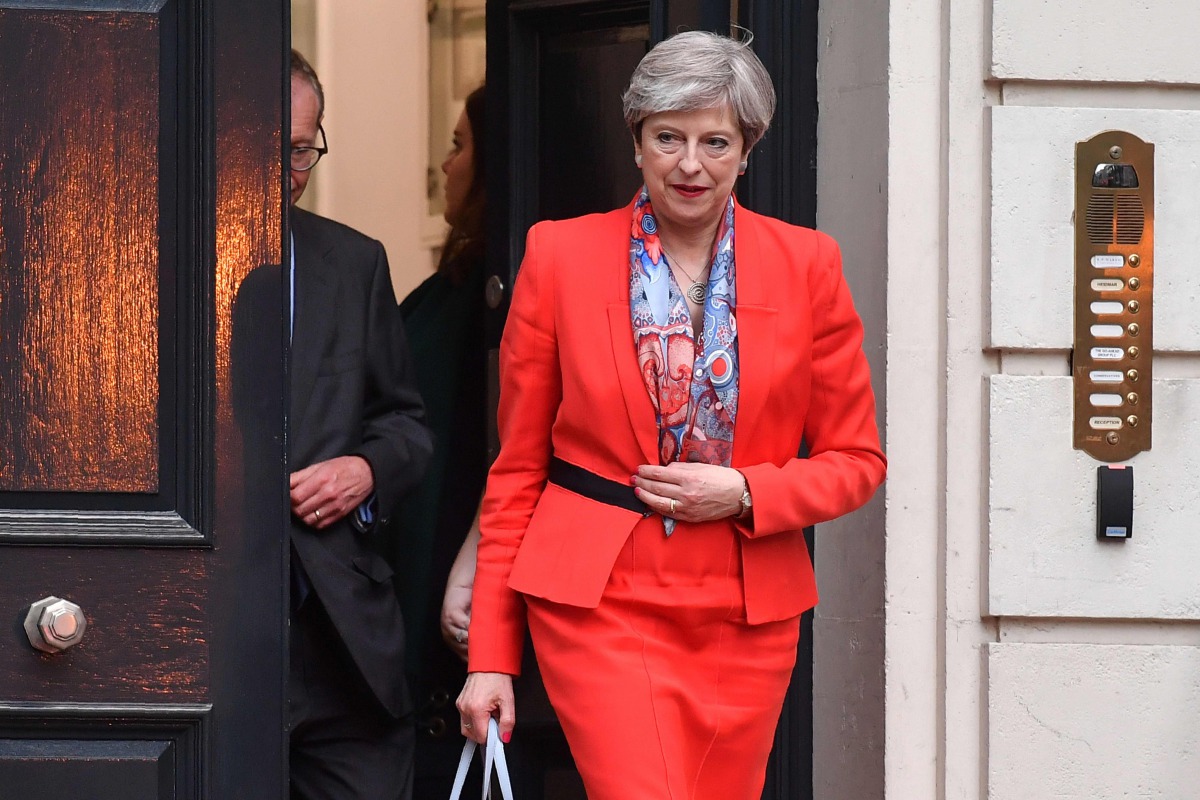 British Prime Minister Theresa May leaves the Conservative Party HQ in central London, on June 9, 2017, hours after the polls closed in the British general election. (AFP / Ben STANSALL)