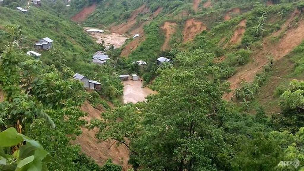 The death toll in Bangladesh's worst ever landslides rose to 154 with the discovery of two more bodies, while locals have blamed the large-scale destruction of trees for the scale of the disaster. (Photo: AFP/STR).