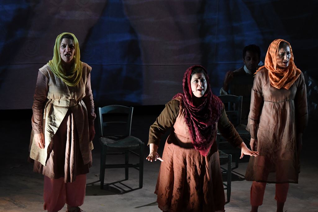 Kamala Sankaram (C) portrays Pakistani women's rights activist Mukhtar Mai in the opera 'Thumbprint' at the Roy and Edna Disney/Calarts Theater (REDCAT) in Los Angeles, California, June 16, 2017. AFP / Robyn Beck 
