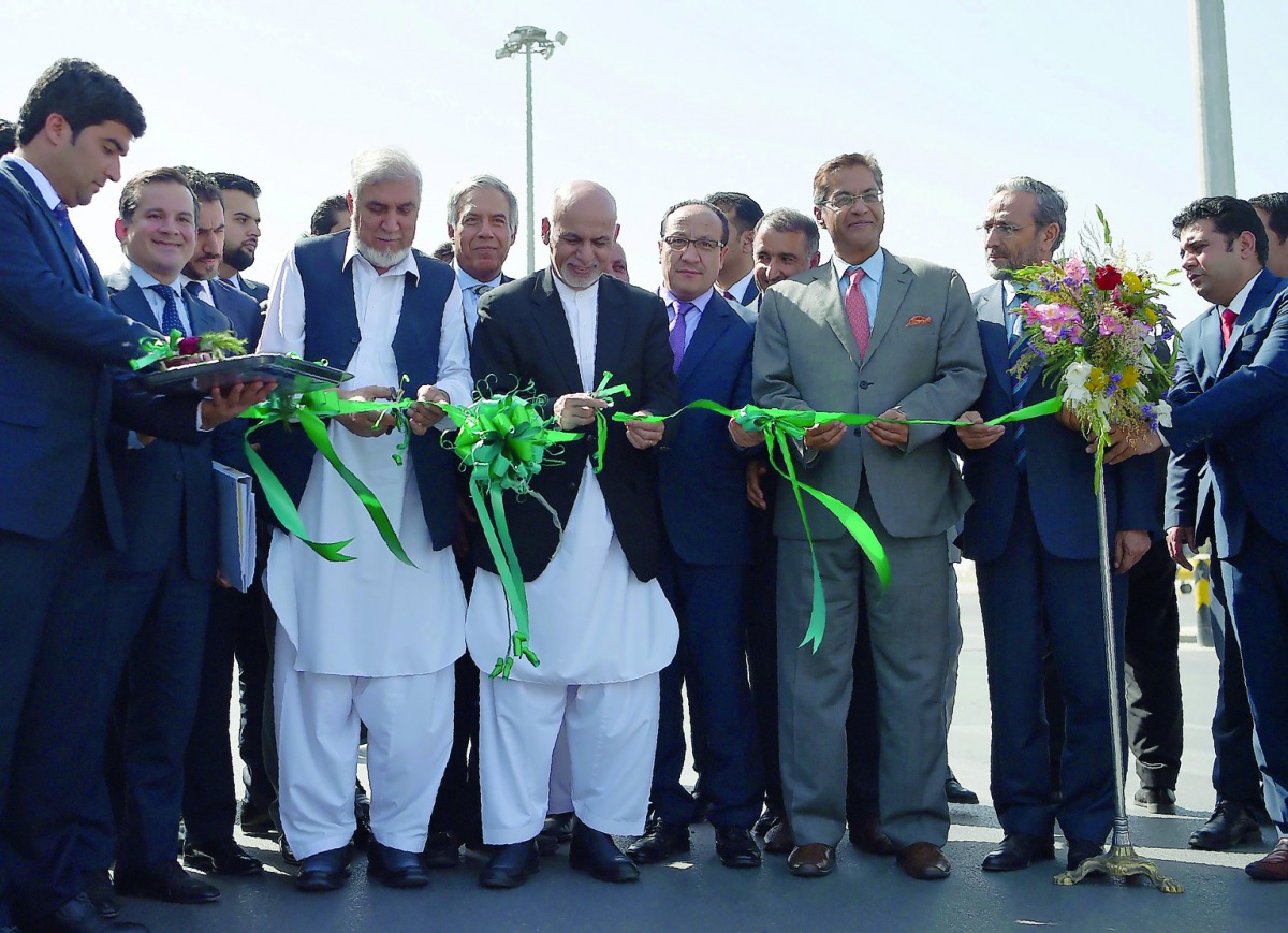 Afghan President Ashraf Ghani cutting a ribbon at the opening ceremony for the first Afghan-India air corridor in Kabul, yesterday.