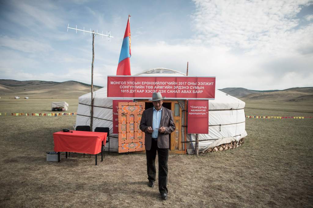 A man leaves after voting in the Mongolian presidential election at the Erdene Sum Ger (Yurt) polling station in Tuul Valley on June 26, 2017. AFP / Fred DUFOUR