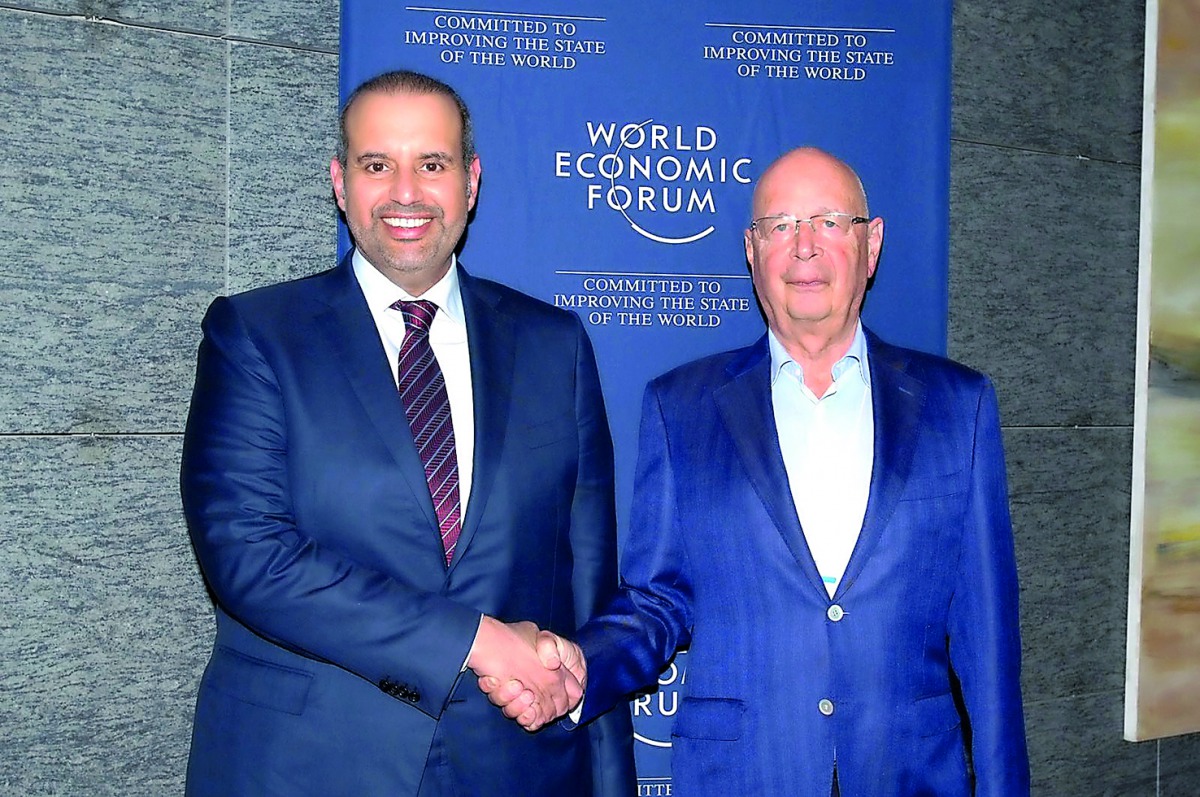 Minister of Economy and Commerce H E  Sheikh Ahmed bin Jassim bin Mohammed Al Thani with Professor Klaus Schwab, Founder and Executive Chairman of the World Economic Forum, in Geneva, yesterday.