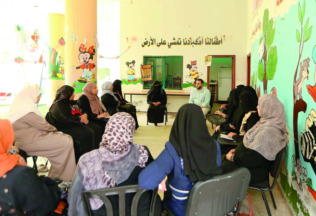 Women in Gaza attending classes conducted by Qatar Charity. 