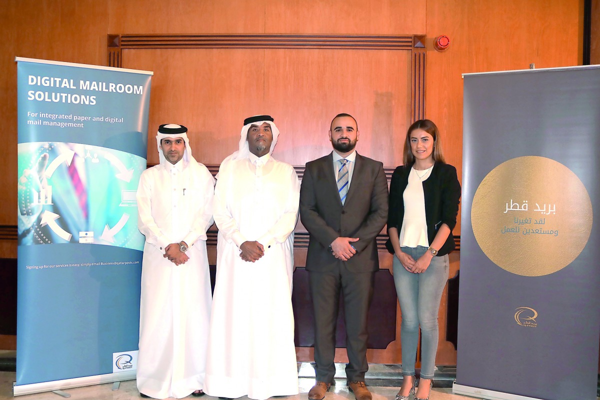 Qatar Post officials at the launch of the Digital Mailroom automation solution.