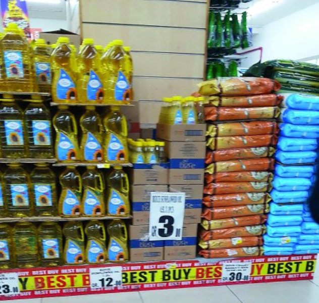 Turkish edible oil bottles are arranged on shelves at a commercial outlet in Doha, yesterday. 