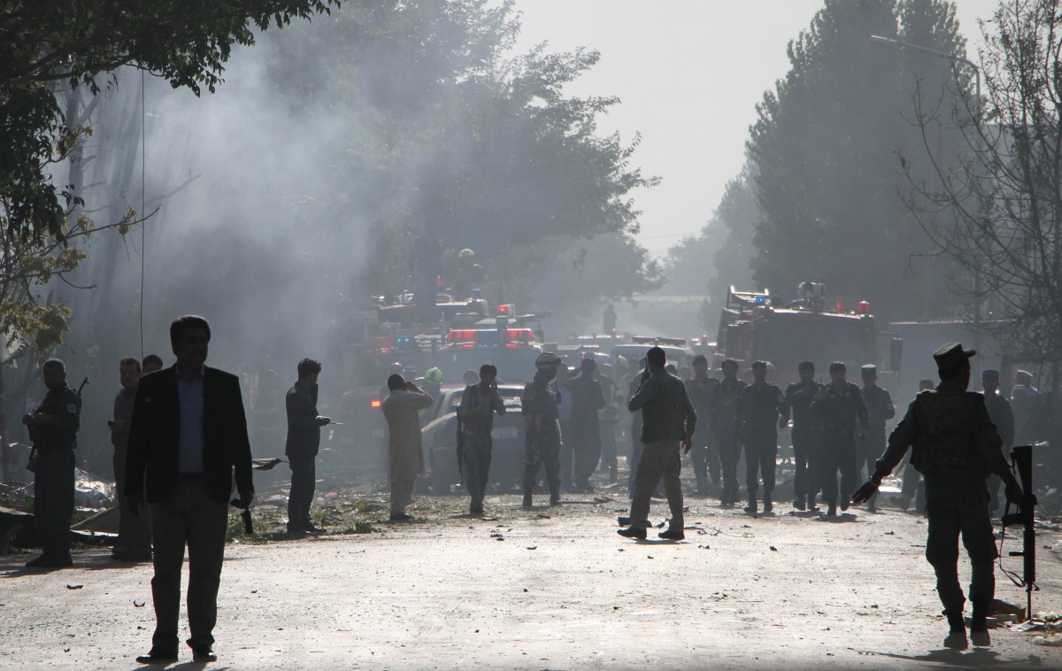 Afghan security officials inspect the Suicide attack site in Kabul, Afghanistan on July 24, 2017. ( Haroon Sabawoon - Anadolu Agency )