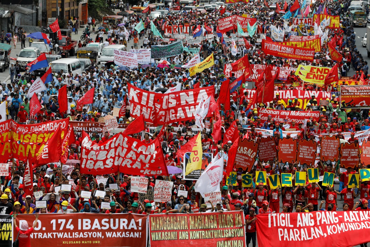 Protesters display anti-government placards and streamers as they march towards the Philippine Congress ahead of President Rodrigo Duterte's State of the Nation address in Quezon city, Metro Manila Philippines July 24, 2017. (REUTERS/Erik De Castro)