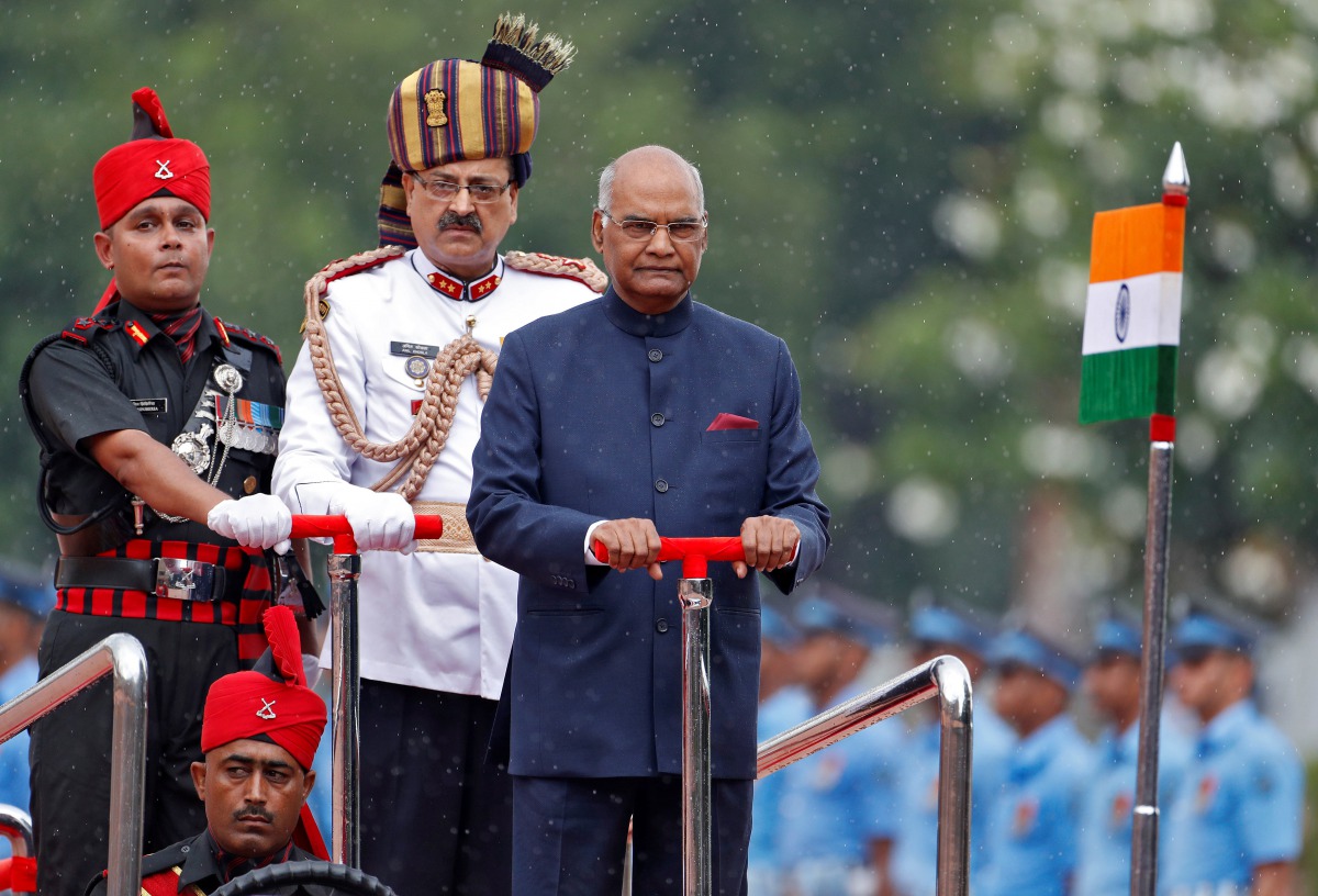 India's new President Ram Nath Kovind inspects an honour guard after being sworn in at the Rashtrapati Bhavan presidential palace in New Delhi, India July 25, 2017. (REUTERS/Cathal McNaughton)