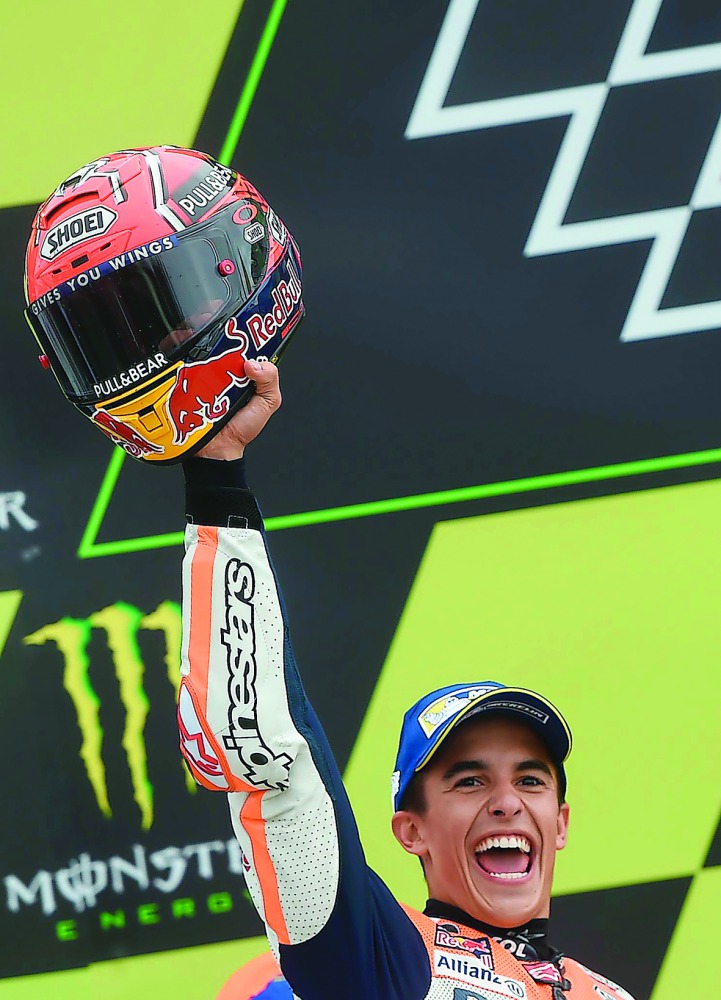 Repsol Honda Team’s Spanish rider Marc Marquez celebrates on the podium after the Czech Grand Prix in Brno yesterday.