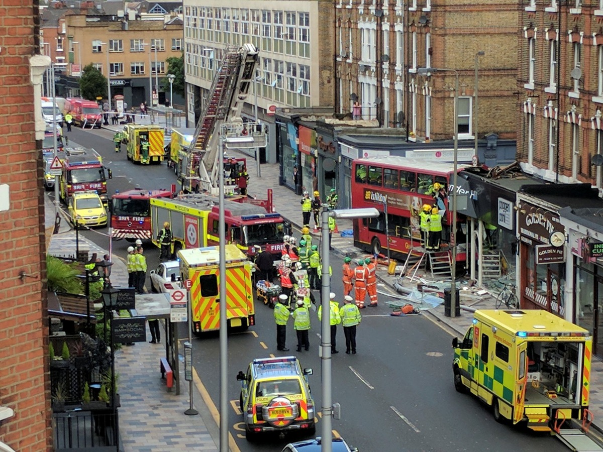 Emergency services attend the scene of a bus crash in Lavender Hill, London August 10, 2017 in this picture obtained on social media. (Brendan Phalhert/Social Media Website/via REUTERS)
