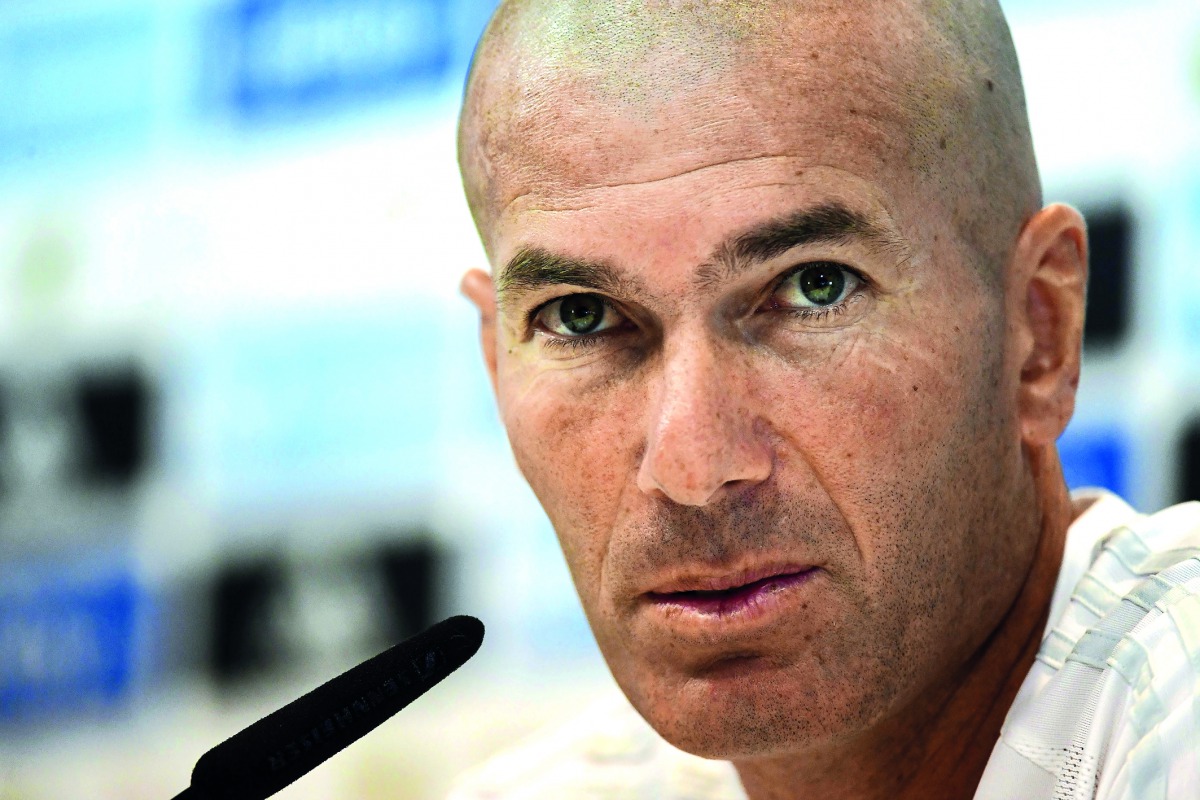 French coach Zinedine Zidane gives a press conference at Real Madrid sport city in Madrid, yesterday on the eve of the Spanish SuperCup first leg football match against FC Barcelona. 