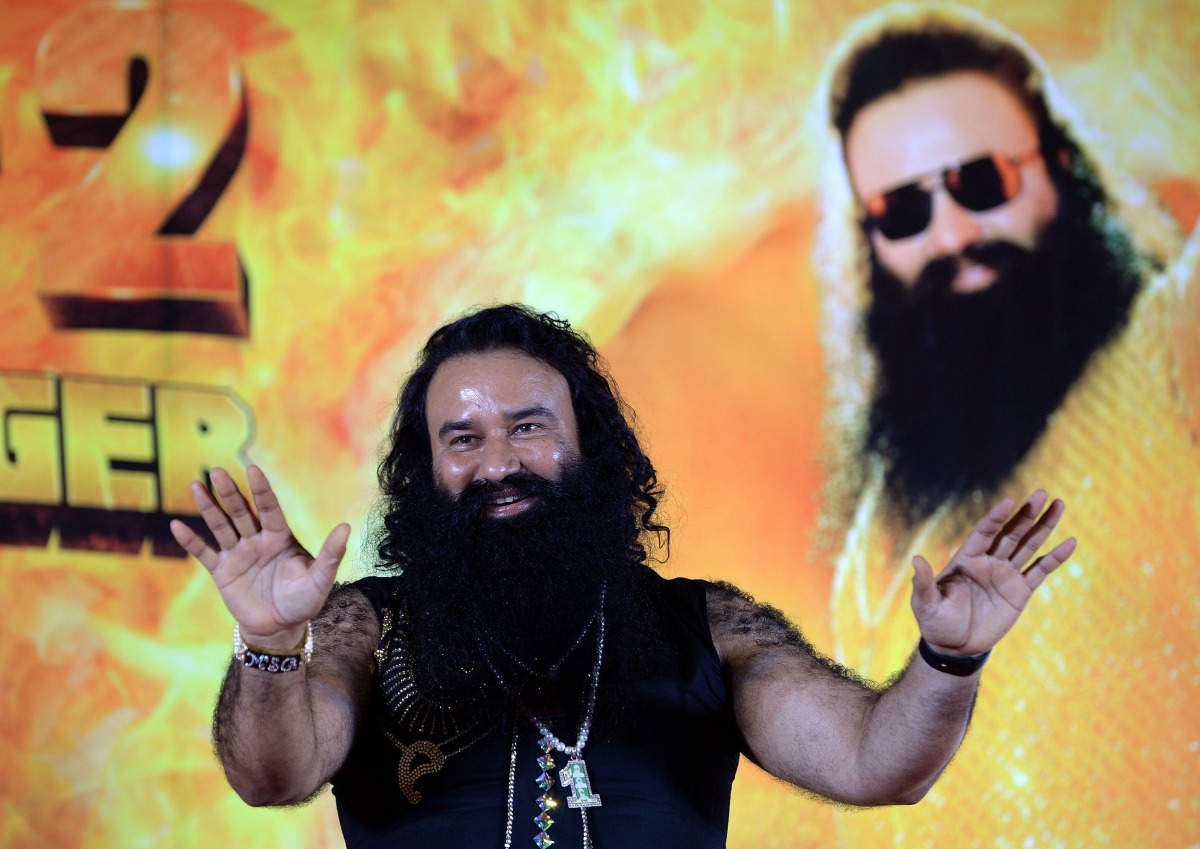 This file photo shows Indian chief of the religious sect Dera Sacha Sauda (DSS) Gurmeet Ram Rahim Singh at a news conference to launch the score for his film 'MSG-2 The Messenger' in Mumbai. AFP / PUNIT PARANJPE