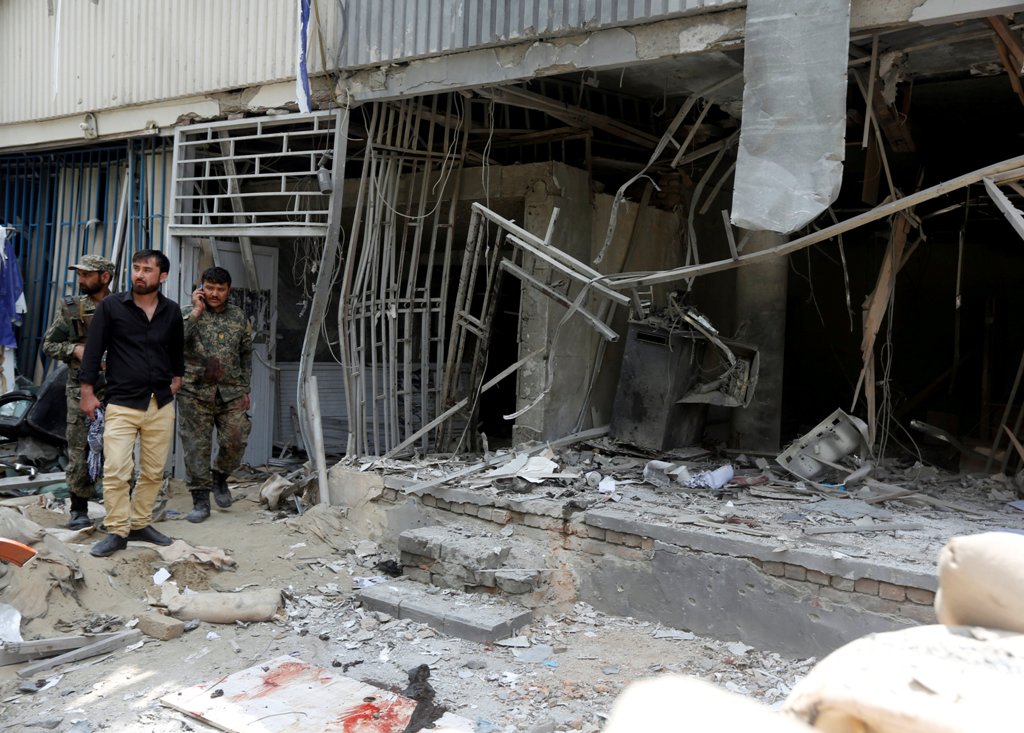Afghan security forces inspect at the site of a suicide bomb attack in Kabul, Afghanistan August 29, 2017. REUTERS/Omar Sobhani