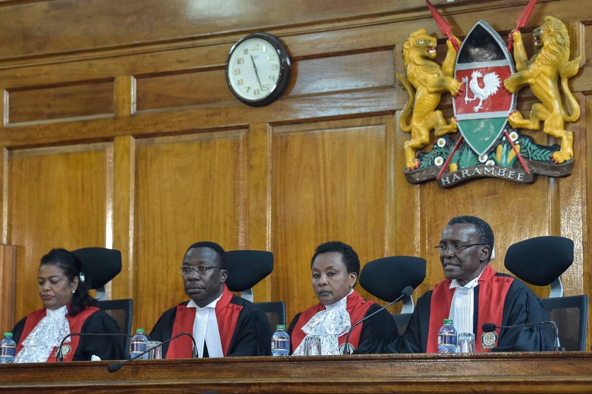 Kenyan Supreme Court judges rule over an opposition petition challenging the result of the August 8 presidential election in Nairobi on September 1, 2017. Kenya's Supreme Court declared the results of last month's presidential poll 