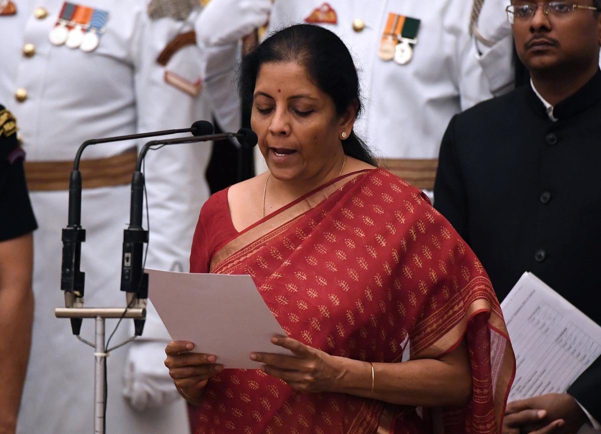 India's ruling Bharatiya Janata Party (BJP) politician and member of parliament Nirmala Sitharaman takes the oath during the swearing-in ceremony of new ministers at the Presidential Palace in New Delhi, India, September 3, 2017. (REUTERS/ Prakash Singh)