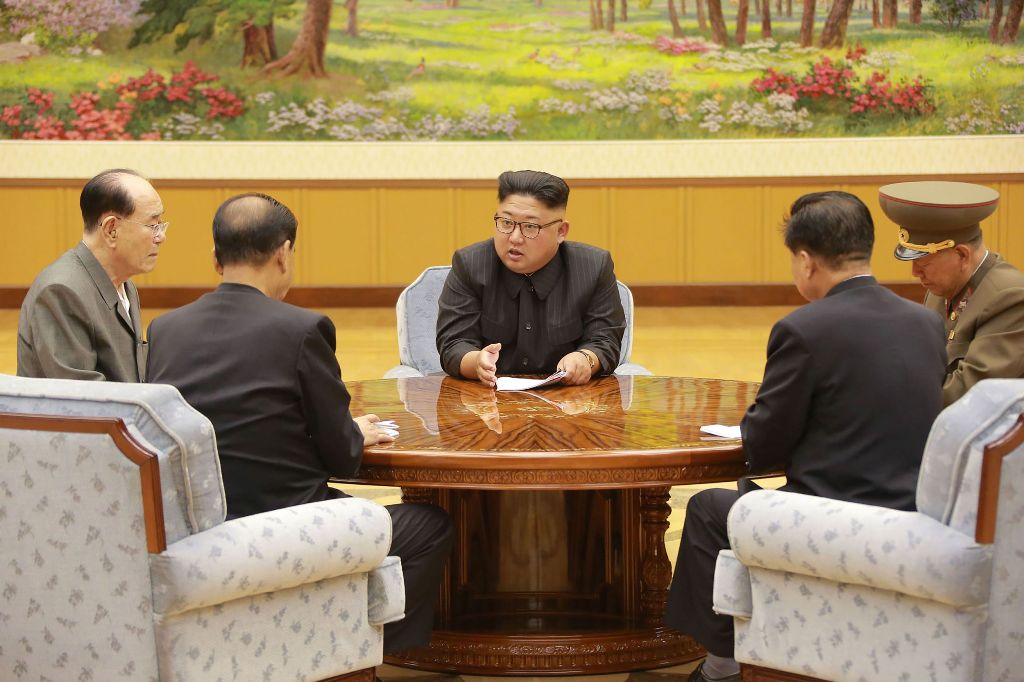 This picture taken on September 3, 2017 and released by North Korea's official Korean Central News Agency (KCNA) on September 4, 2017 shows North Korean leader Kim Jong-Un (C) attending a meeting with a committee of the Workers' Party of Korea about the t