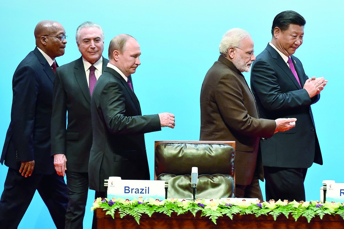 From L-R: South Africa's President Jacob Zuma, Brazilian President Michel Temer, Russian President Vladimir Putin, Indian Prime Minister Narendra Modi, and Chinese President Xi Jinping attend the BRICS Business Council and signing ceremony at the BRICS Su