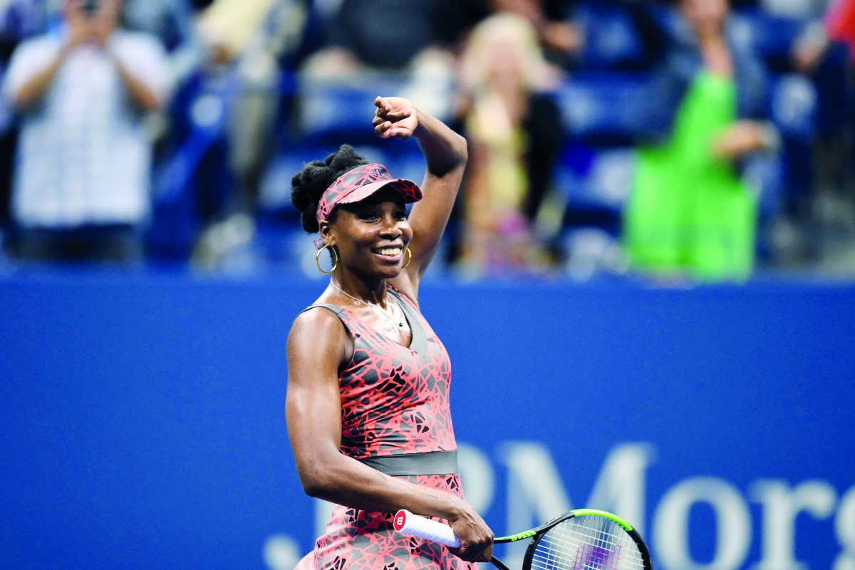 Venus Williams of the US celebrates after defeating Spain’s Carla Suarez Navarro during their 2017 US Open Women’s Singles match at the USTA Billie Jean King National Tennis Center in New York on Sunday. Williams won the match 6-3, 3-6, 6-1.