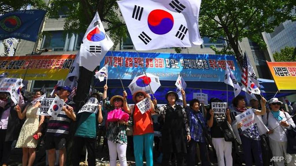 The leader of a South Korean opposition party which split from president Park Geun-Hye's grouping as she was engulfed in a corruption scandal last year has herself stepped down over graft allegations. (Photo: AFP/Jung Yeon-Je).