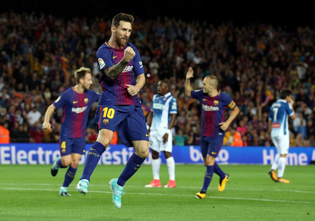Barcelona’s Lionel Messi celebrates scoring their first goal. REUTERS/Albert Gea