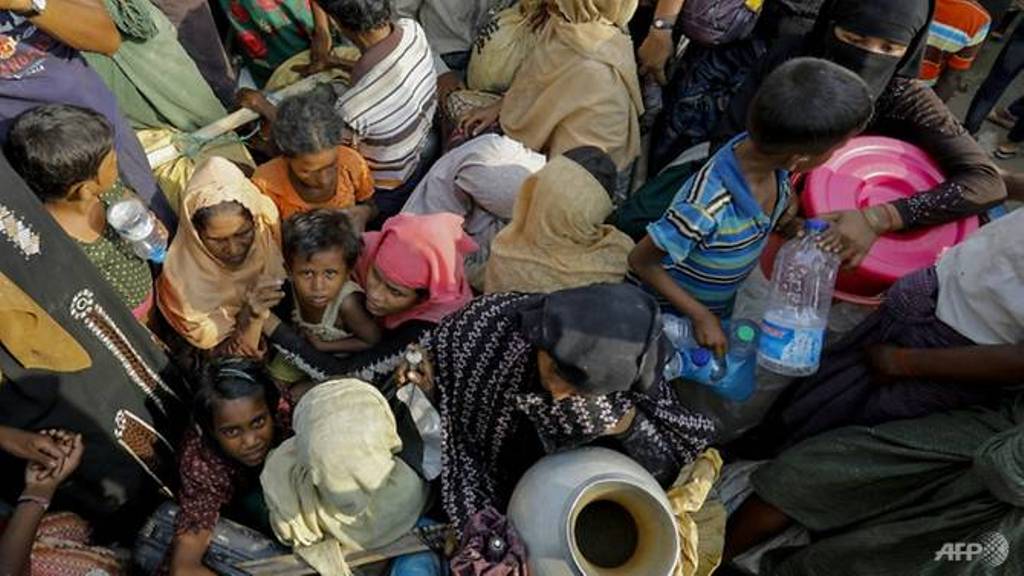 Around 164,000 mostly Rohingya refugees have crossed into Bangladesh in the last fortnight to escape fighting in Myanmar's Rakhine state, the UN says. (Photo: AFP/K M Asad).