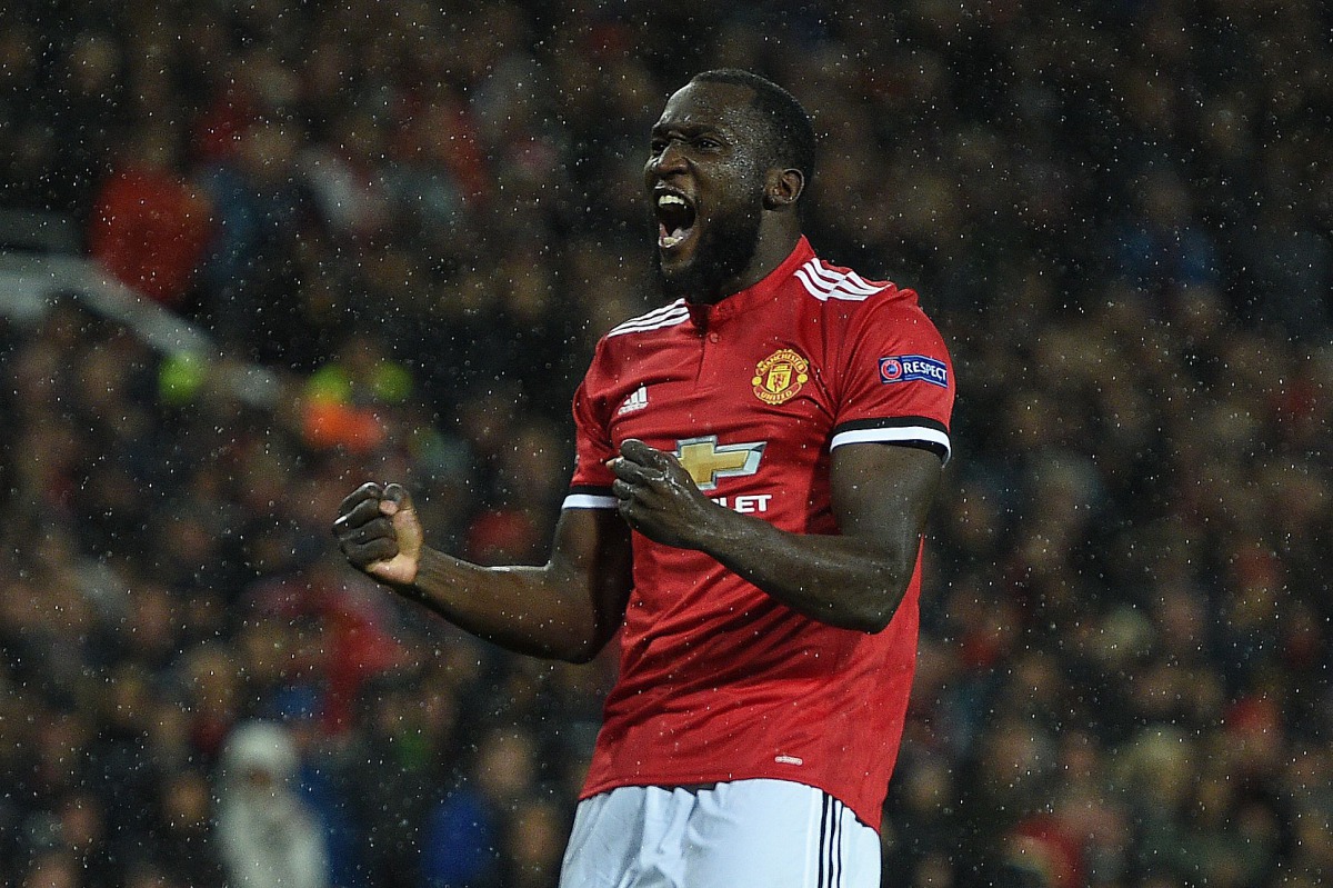 Manchester United's Belgian striker Romelu Lukaku celebrates scoring his team's second goal during the UEFA Champions League Group A football match between Manchester United and Basel at Old Trafford in Manchester, north west England on September 12, 2017