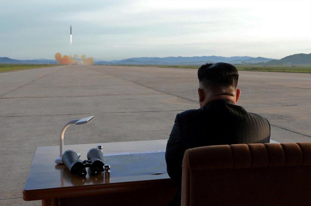 North Korean leader Kim Jong Un watches the launch of a Hwasong-12 missile in this undated photo released by North Korea's Korean Central News Agency (KCNA) on September 16, 2017. KCNA via REUTERS.