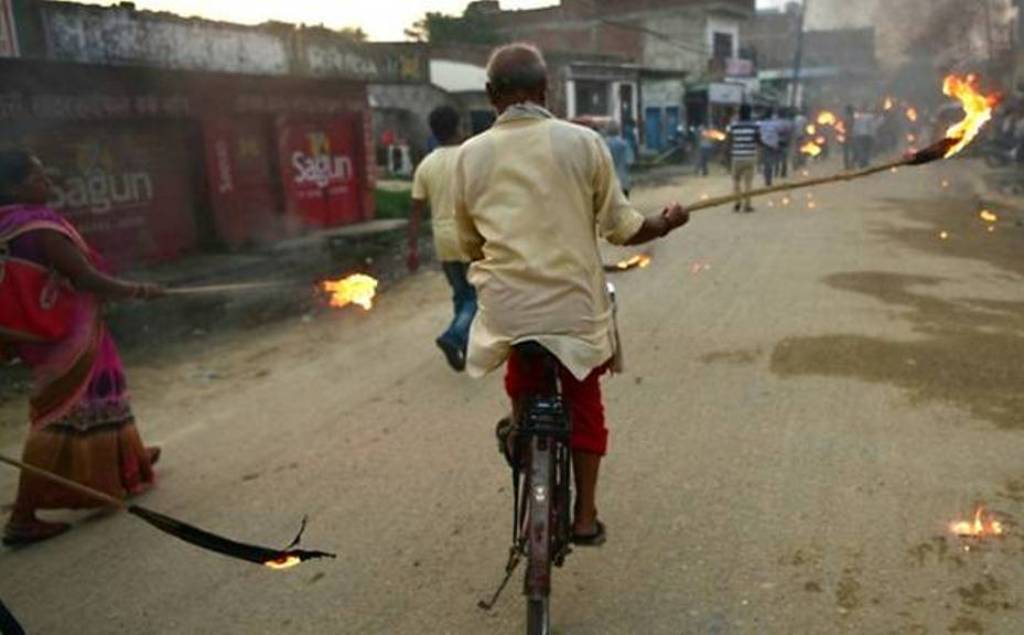 Nepali Madhesi protestors - a marginalised group in the southern plains - hold a torch rally in Janakpur as they protest against local elections. (Photo: AFP/PRAKASH MATHEMA).