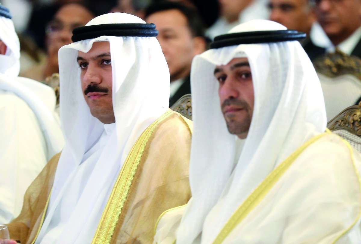 Kuwaiti Finance Minister Anas al-Saleh (R) and Mohammad al-Hashel, Kuwait's Central Bank Governor, attend the Euromoney conference held in the capital Kuwait City on September 26, 2017. AFP / Yasser Al-Zayyat