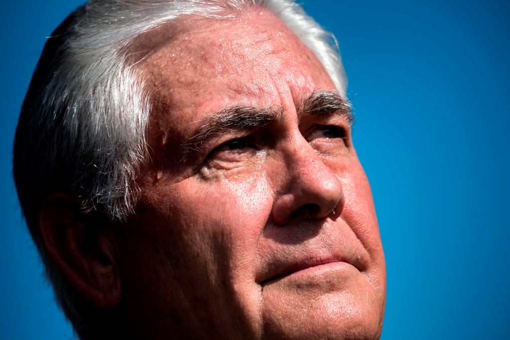 (FILES) This file photo taken on September 11, 2017 shows US Secretary of State Rex Tillerson listening while US President Donald Trump speaks during a memorial service at the Pentagon for the 9/11 terrorist attacks in Washington, DC.   AFP / Brendan Smia