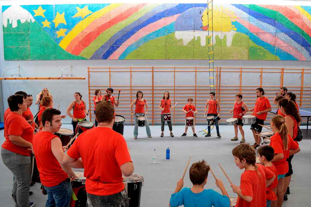 A batucada group play drums with children inside a school at the Gracia neighbourhood in Barcelona on September 30, 2017. Supporters of an independence referendum in Catalonia opposed by Madrid occupied would-be polling stations yesterday in a bid to ensu