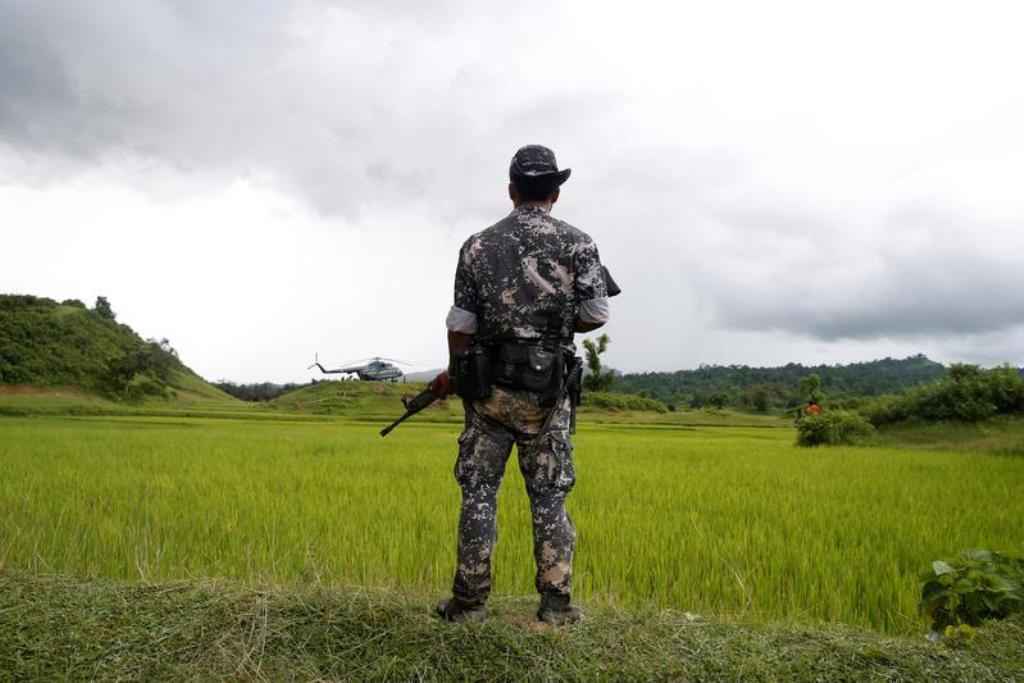 A Myanmar soldier stands near Maungdaw, north of Rakhine state, Myanmar September 27, 2017. REUTERS/Soe Zeya Tun.