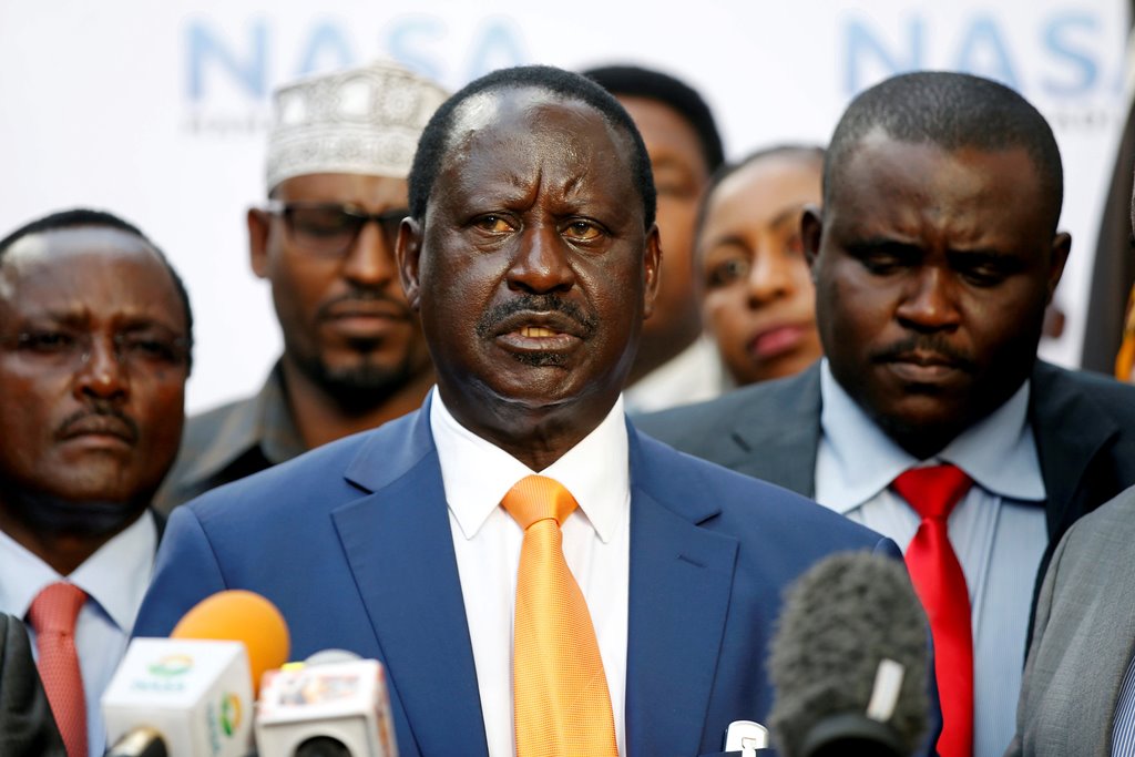 Kenyan opposition leader Raila Odinga (C), the presidential candidate of the National Super Alliance (NASA) coalition speaks during a news conference. REUTERS/Baz Ratner