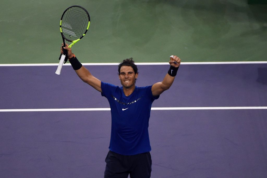 Rafael Nadal of Spain celebrates his victory against Marin Cilic of Croatia during their men's singles semi-final match at the Shanghai Masters tennis tournament in Shanghai on October 14, 2017. / AFP / CHANDAN KHANNA