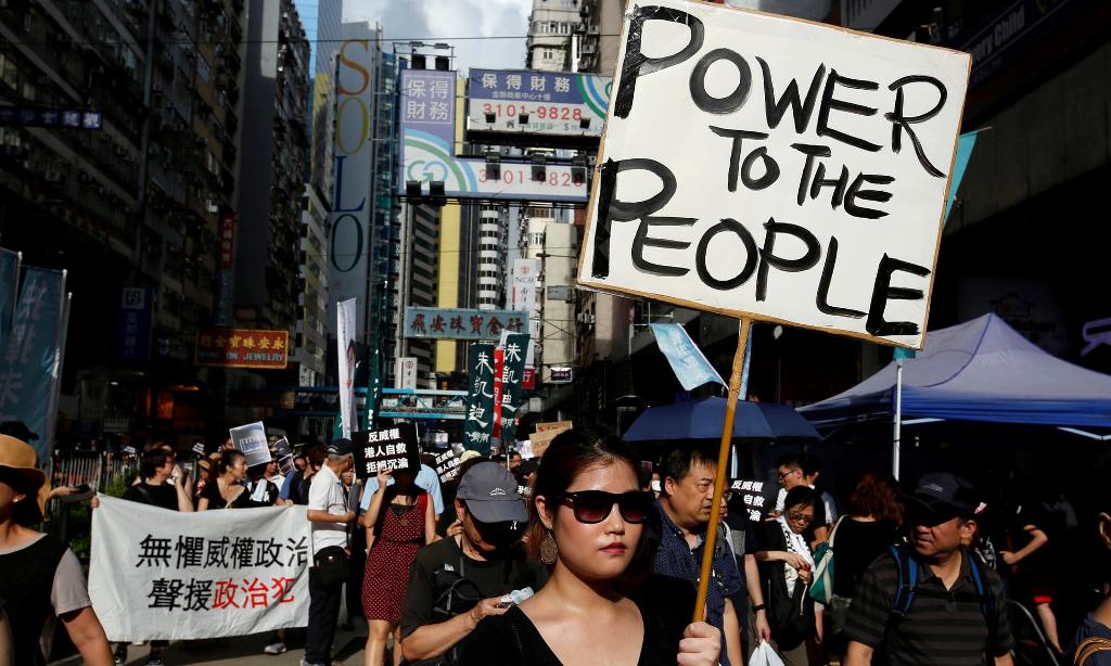  Pro-democracy activists take part in a protest on China’s national day in Hong Kong earlier this month Photograph: Bobby Yip/Reuters.